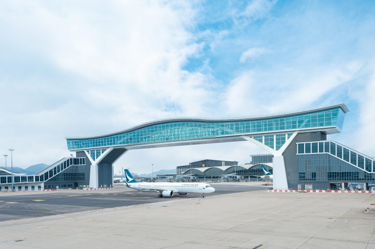 First passengers cross Hong Kong International Airport’s Sky Bridge